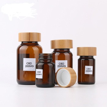 New Arrived Amber Cbd E Liquid Bottle Amber Glass Bottle with Bamboo Lid Child Proof Cap