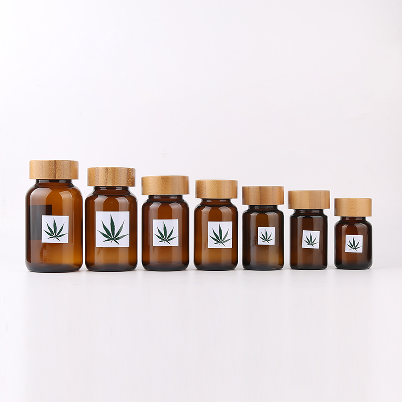 New Arrived amber cbd bottle glass bottle pharmaceutical amber glass bottle amber glass jar with bamboo lid
