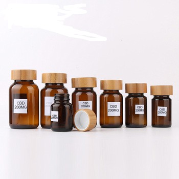 New Arrived amber cbd bottle glass bottle pharmaceutical amber glass bottle amber glass jar with bamboo lid