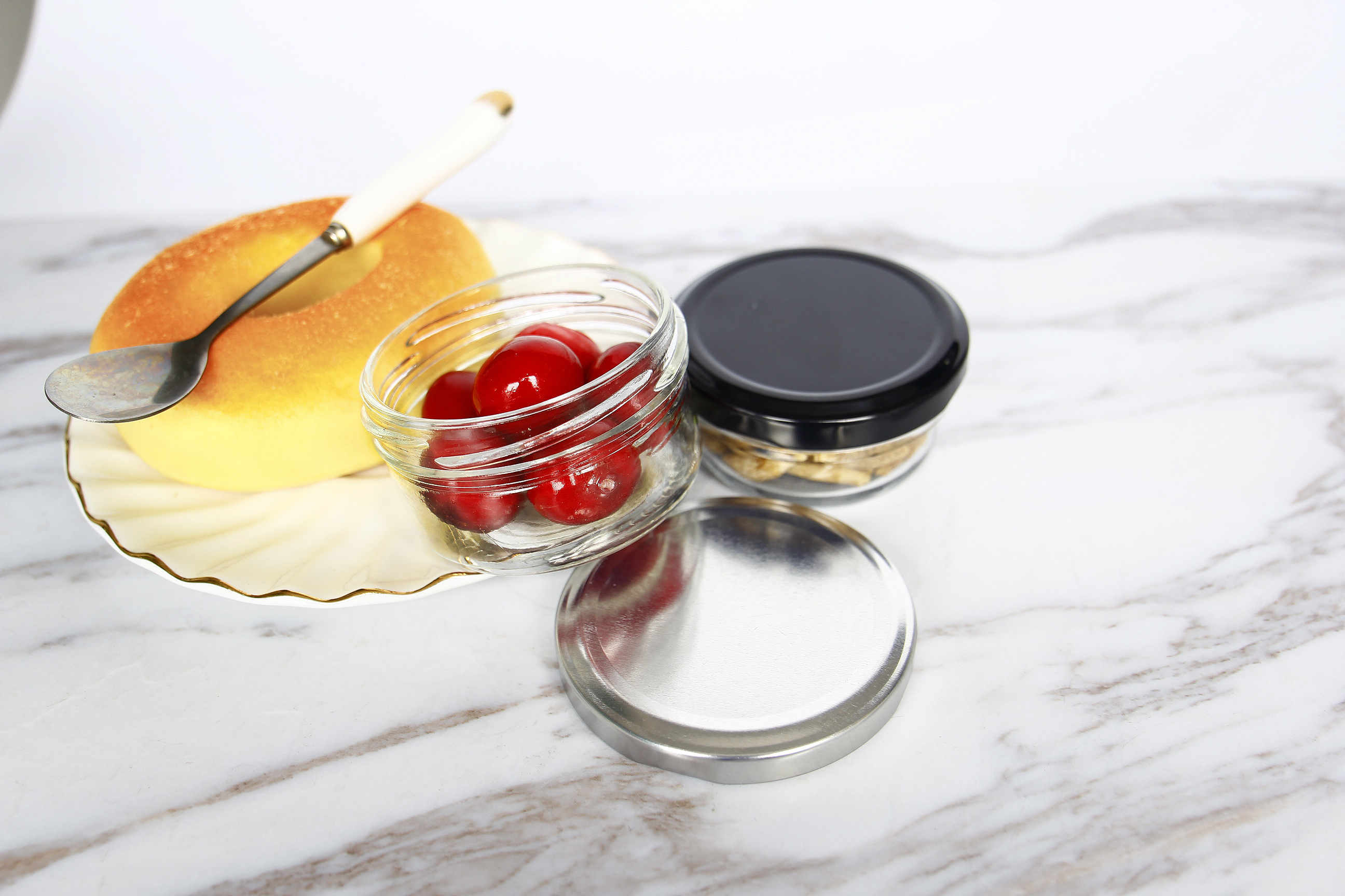 New Design Cylinder Bird Nest Bottle Glass Jam Jar Food Storage Preserve Honey Glass Screw Metal Lid Customized Logo Cover