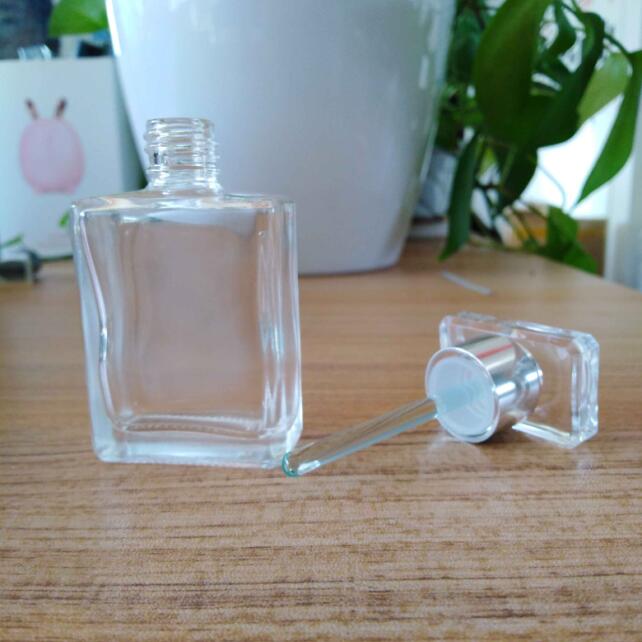 New Design Empty Luxury 15ml Flat Square Glass Stick Bottles Glass Applicator Bottle for Essential Oil