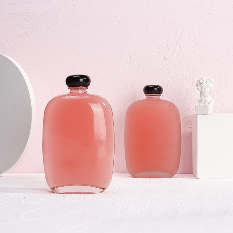 New Design Round Juice Glass Bottles 350ml 500ml with lids for sale in bulk popular for coffee kombucha tea package with frost