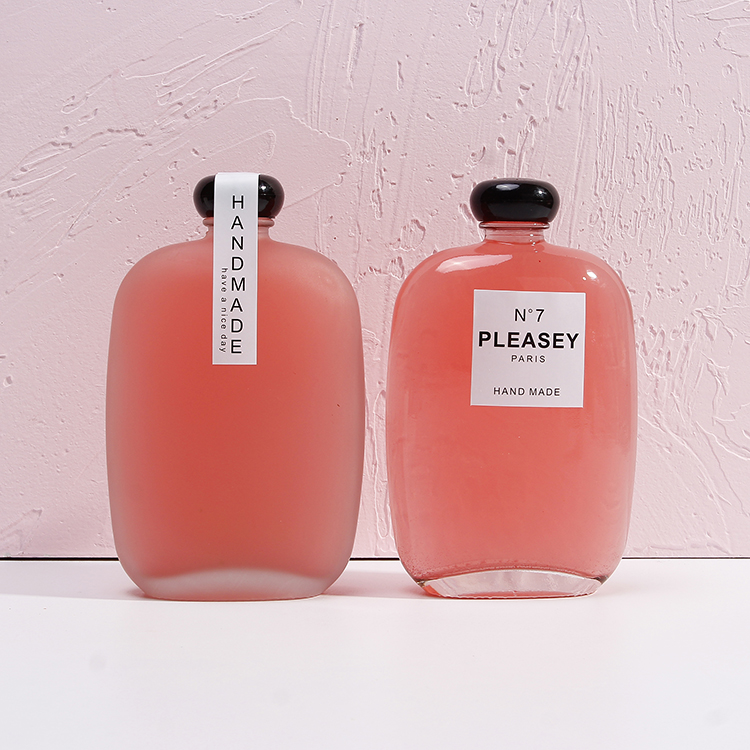 New Design Round Juice Glass Bottles 350ml 500ml with lids for sale in bulk popular for coffee kombucha tea package with frost