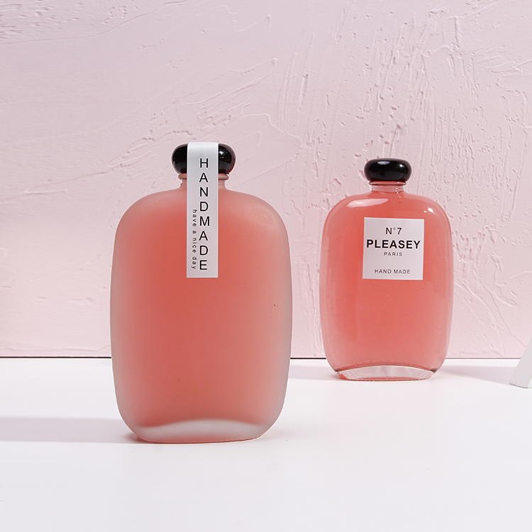 New Design Round Juice Glass Bottles 350ml 500ml with lids for sale in bulk popular for coffee kombucha tea package with frost