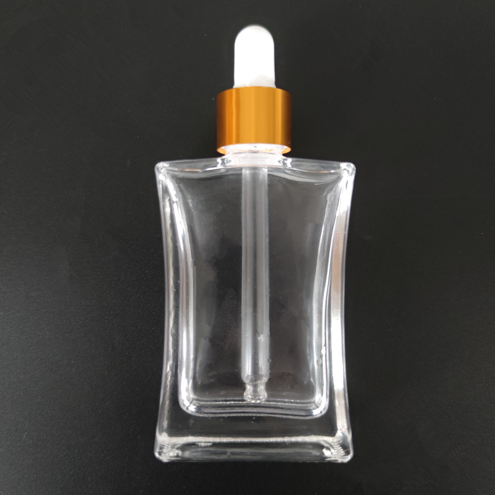 New Gold Square 30ml 50ml 100ml Draw back Transparent Glass Perfume essential oil lotion essence Gold Dropper Bottle