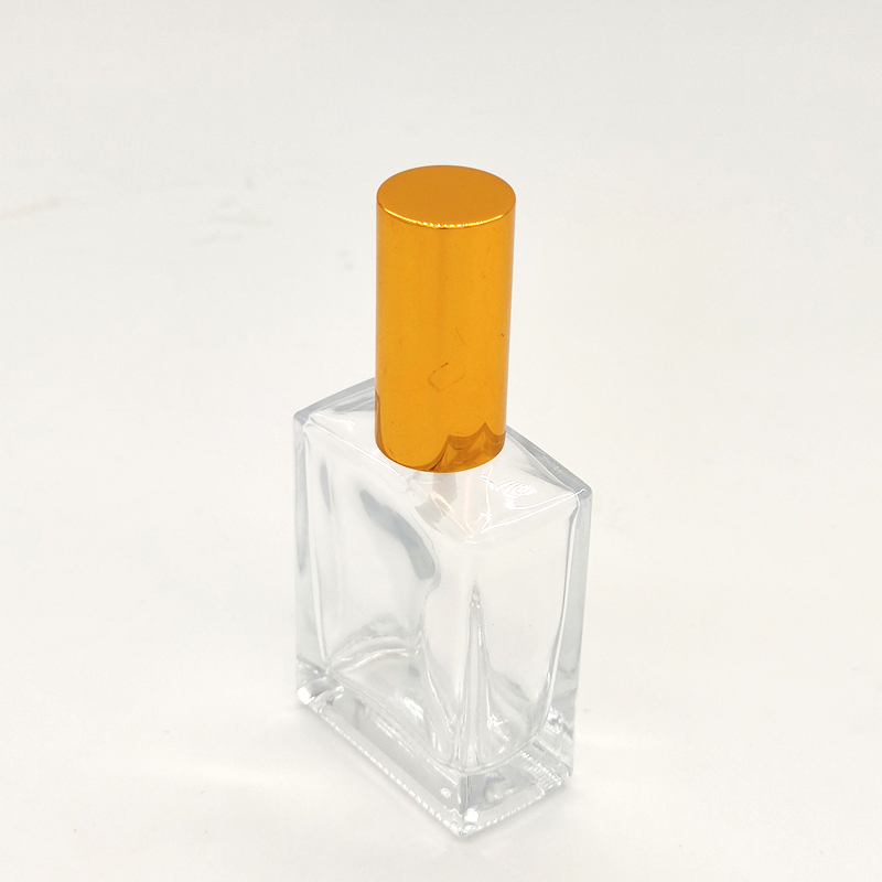 New Patter Gold Square Perfume Bottle 30ml 50ml 100ml Transparent Glass Perfume essential oil Bottle with Spray