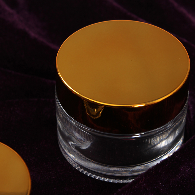 New Round Cosmetic Mini Clear Glass Cream Jar with Gold Lid