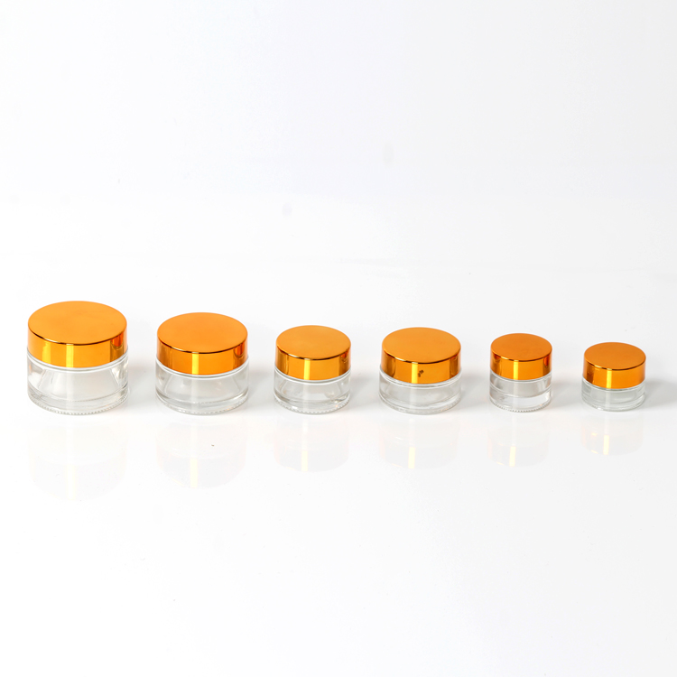 New Round Cosmetic Mini Clear Glass Cream Jar with Gold Lid