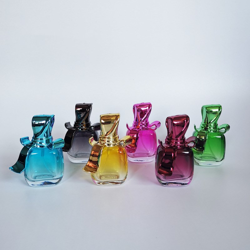 New Style Hot selling 25ml candy-shaped Glass pump Perfume Bottles With Screw Sprayer Cap for fragrance