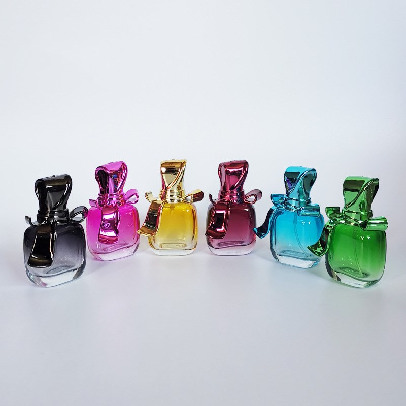 New Style Hot selling 25ml candy-shaped Glass pump Perfume Bottles With Screw Sprayer Cap for fragrance