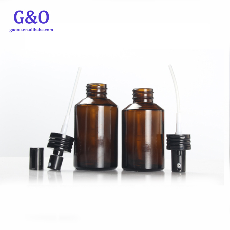 New cheap 50g 100g spray Amber glass essential oil empty cosmetic clear bottle gold silver lid cream jar