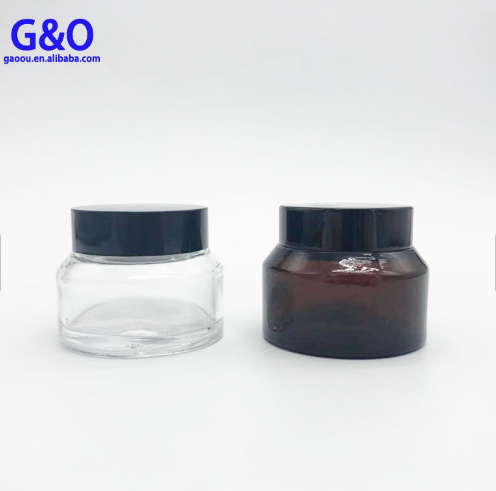 New cheap 50g 100g spray Amber glass essential oil empty cosmetic clear bottle gold silver lid cream jar