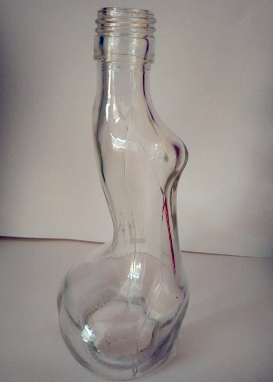 New design 100ml super flint women shaped glass wine bottle