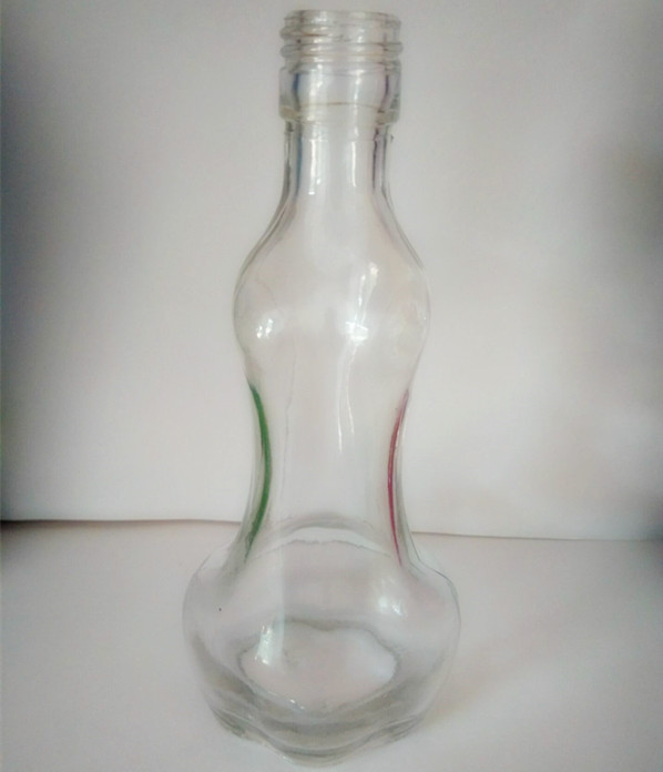 New design 100ml super flint women shaped glass wine bottle