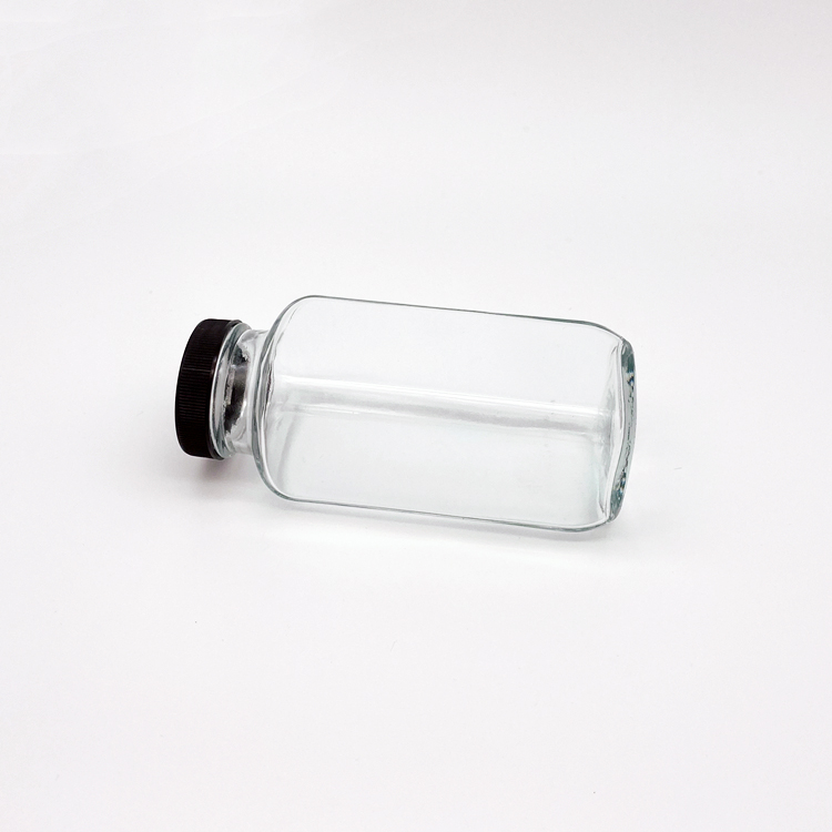 New design 250ml square clear glass juice beverage bottle with black plastic cap
