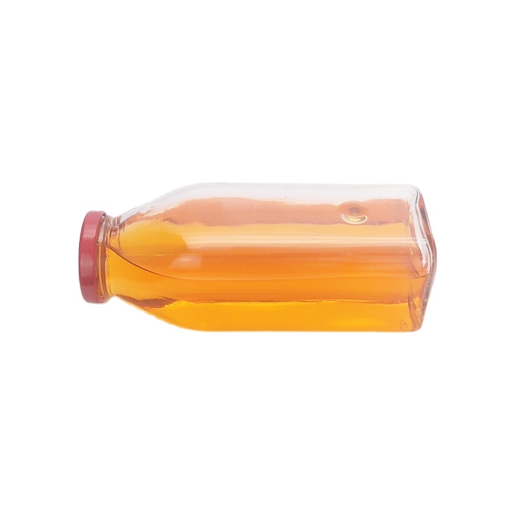 New design 500ml square clear glass water juice beverage bottle with red metal lid