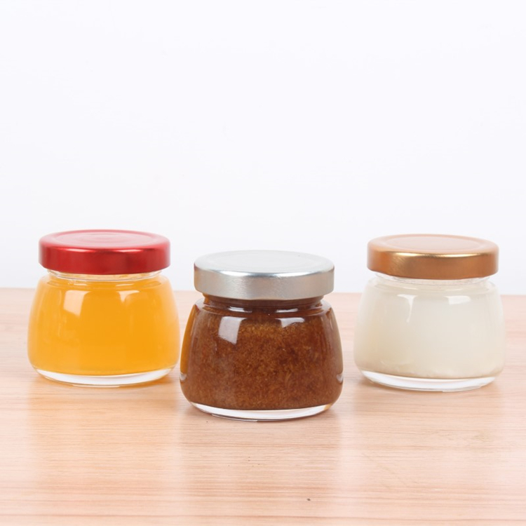 New design 50ml 75ml 120ml 150ml mini clear bird nest glass jar with metal lid wholesale