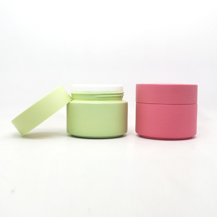 New design luxury 50g 100g face scrub baby pink blue porcelain jars with pink frosted plastic lids