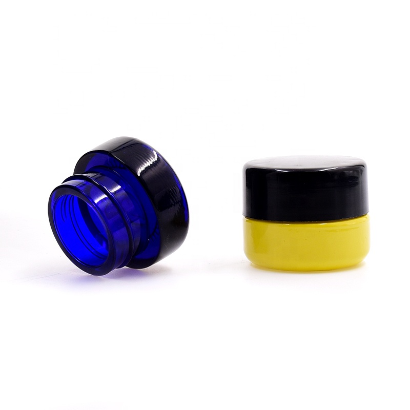 New product 10 ml dark blue round straight side eye cream cosmetic packing glass jar with plastic child proof lid.