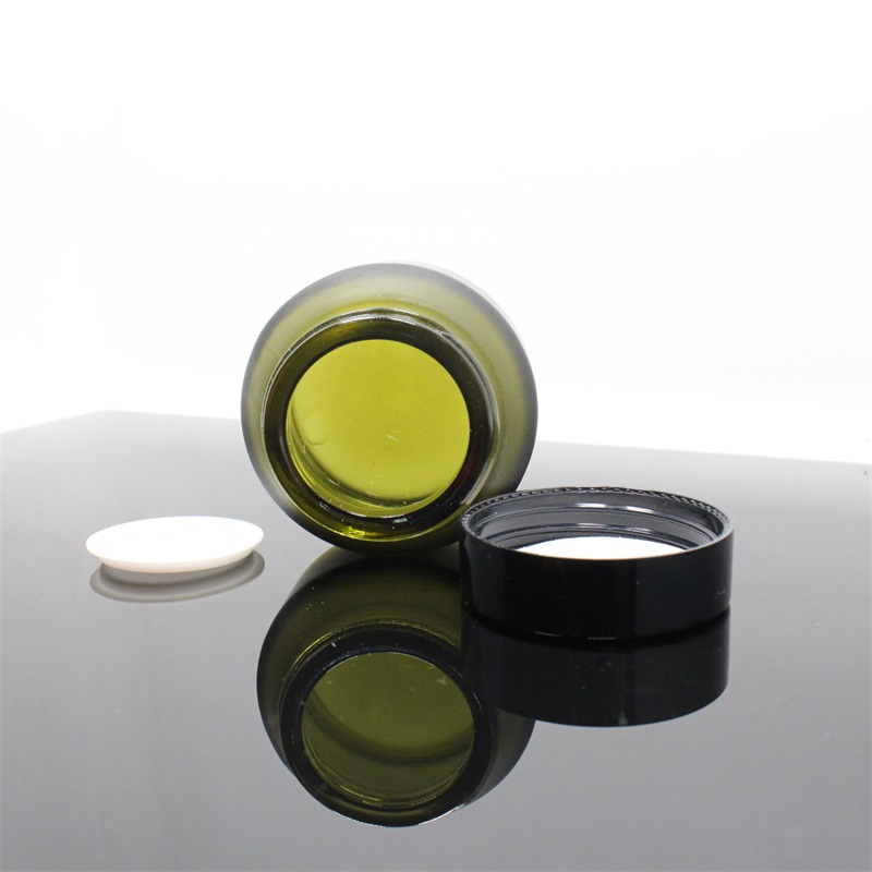 New product 15g 30g 50g Oblique shoulders amber green cosmetic glass jar with black lid customized logo and color