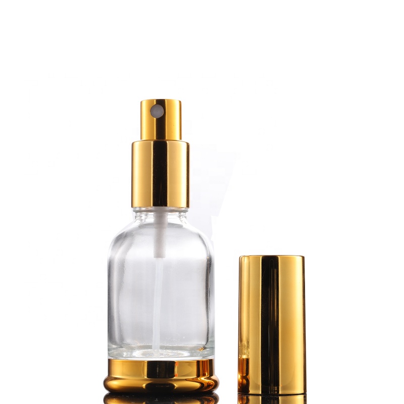 New products 30ml 50ml clear empty glass bottle 30ml spray bottle with golden aluminum lid and bottom