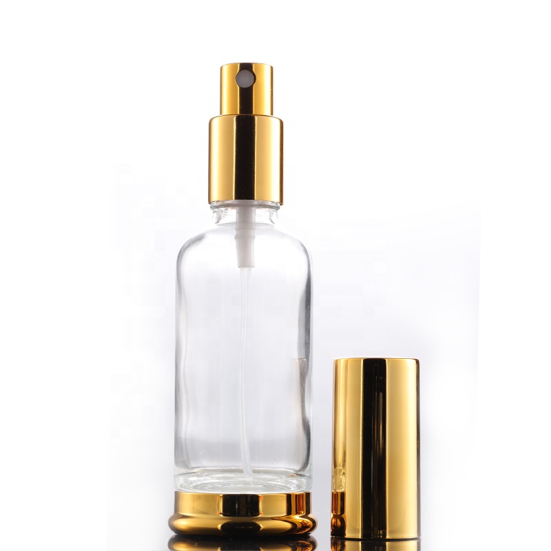 New products 30ml 50ml clear empty glass bottle 30ml spray bottle with golden aluminum lid and bottom