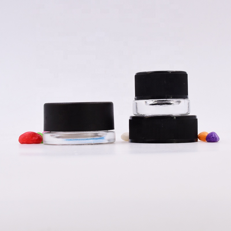 New style  9 ml clear round  small  straight side eye cream cosmetic packing  glass jar with black  plastic child proof lid.