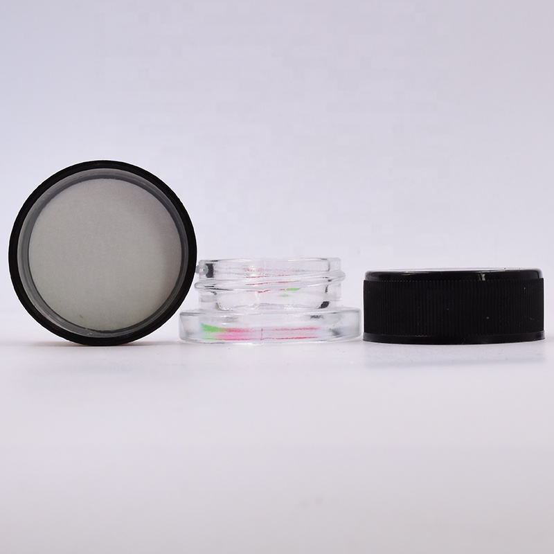 New style 9 ml clear round small straight side eye cream cosmetic packing glass jar with black plastic child proof lid.