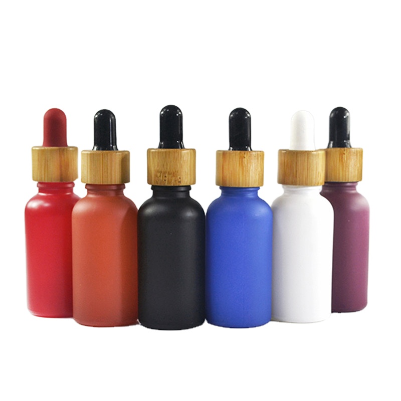 New wholesale 1 oz matte black empty glass essential oil bottle with bamboo dropper