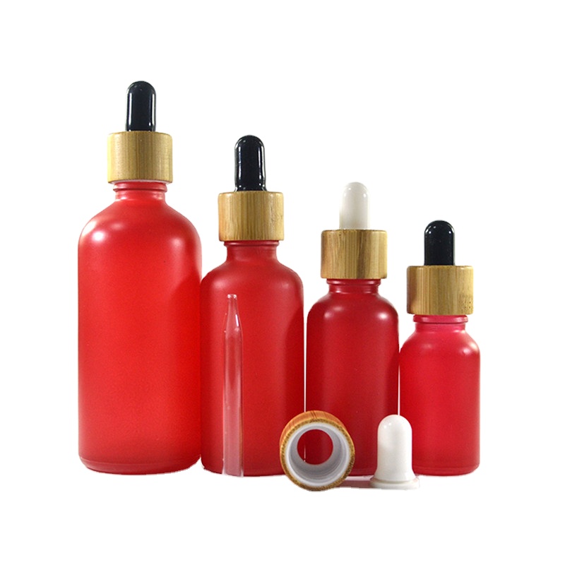 New wholesale 1 oz matte black empty glass essential oil bottle with bamboo dropper