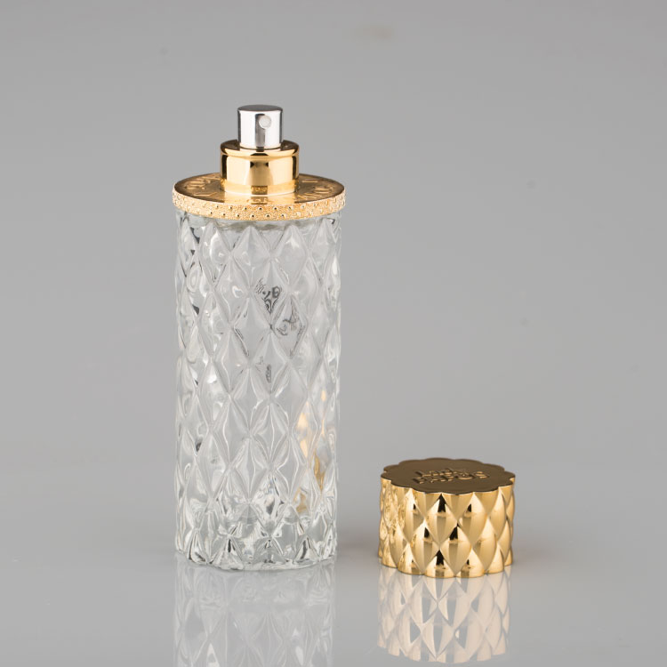Newest Design Golden Luxury 100ml Round Glass Perfume Bottle with Screw Cap