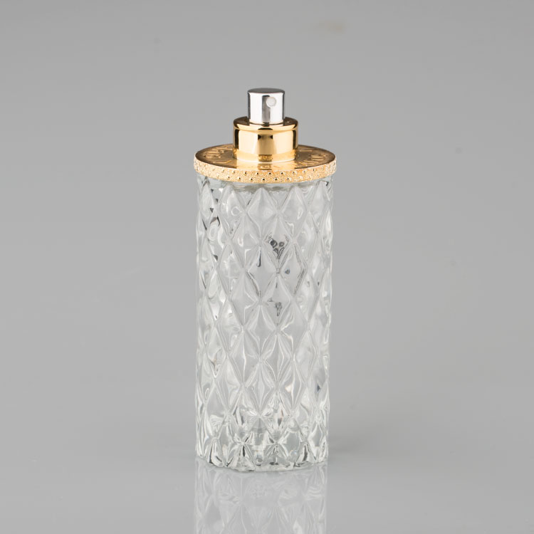 Newest Design Golden Luxury 100ml Round Glass Perfume Bottle with Screw Cap