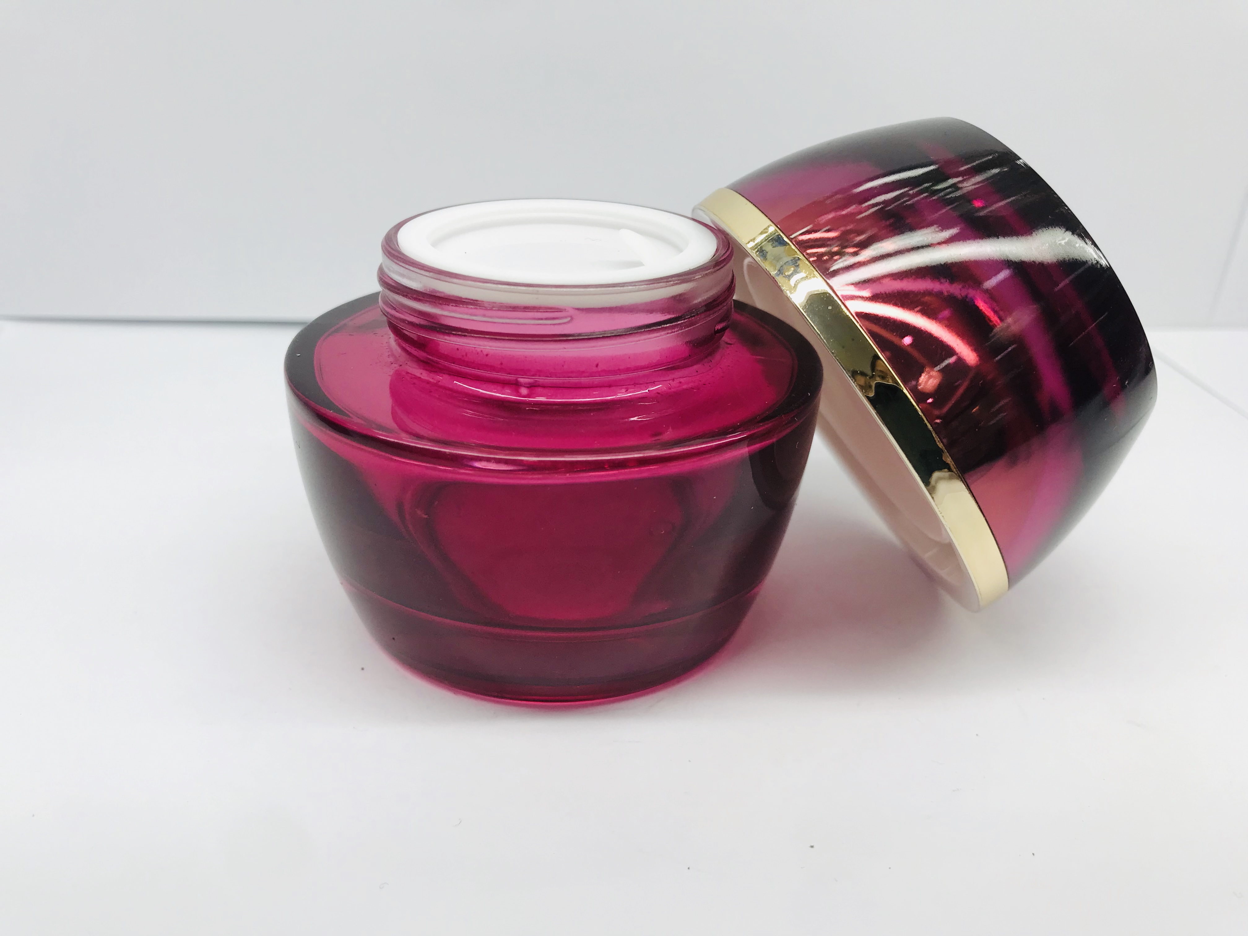 Novelty design pink violet color glass bottle with gplden pump