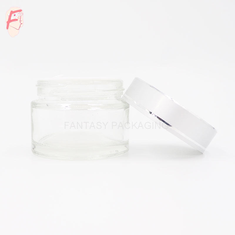 OEM 50g glass material clear jar transparent cosmetic cream jar glass bottle can be made frosted and colored as your request