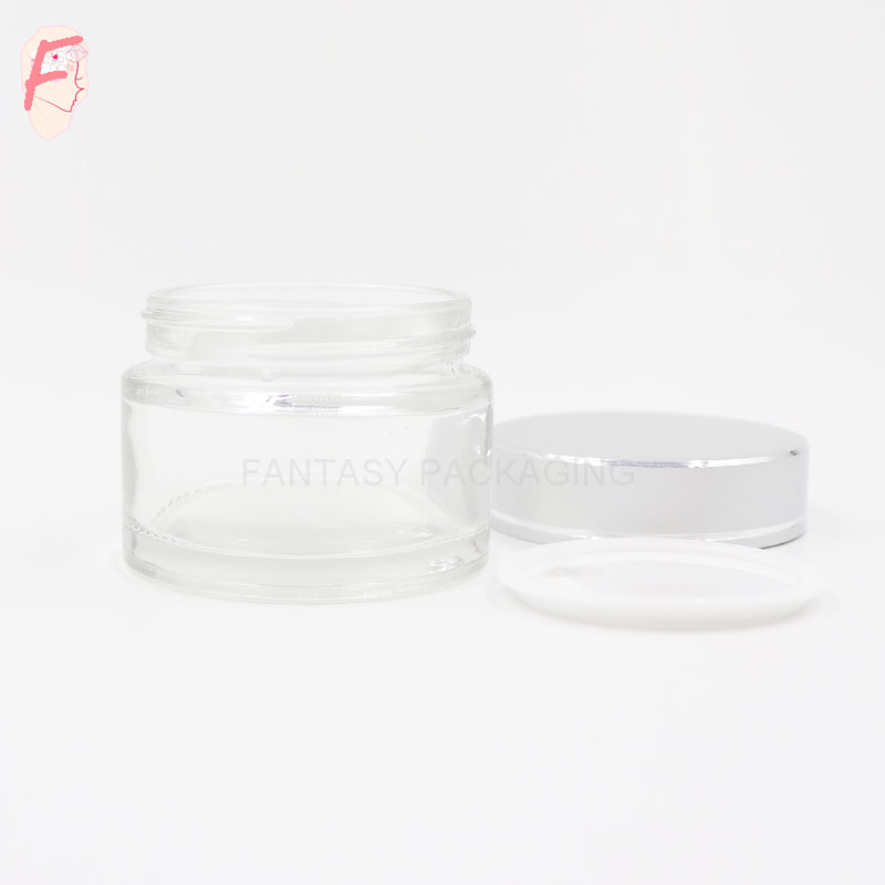 OEM 50g glass material clear jar transparent cosmetic cream jar glass bottle can be made frosted and colored as your request