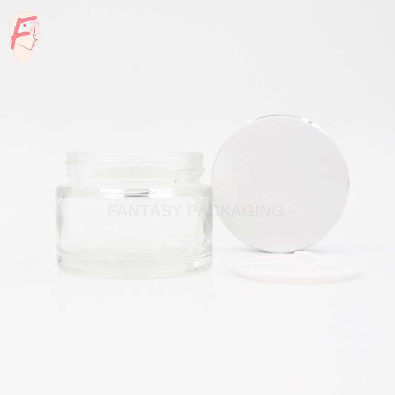 OEM 50g glass material clear jar transparent cosmetic cream jar glass bottle can be made frosted and colored as your request