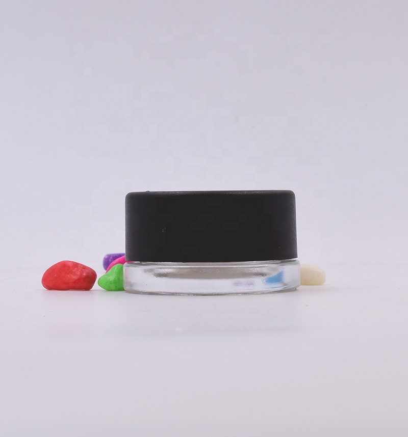OEM 9 ml clear round  small  straight side eye cream cosmetic packing  glass jar with black  plastic child proof lid.
