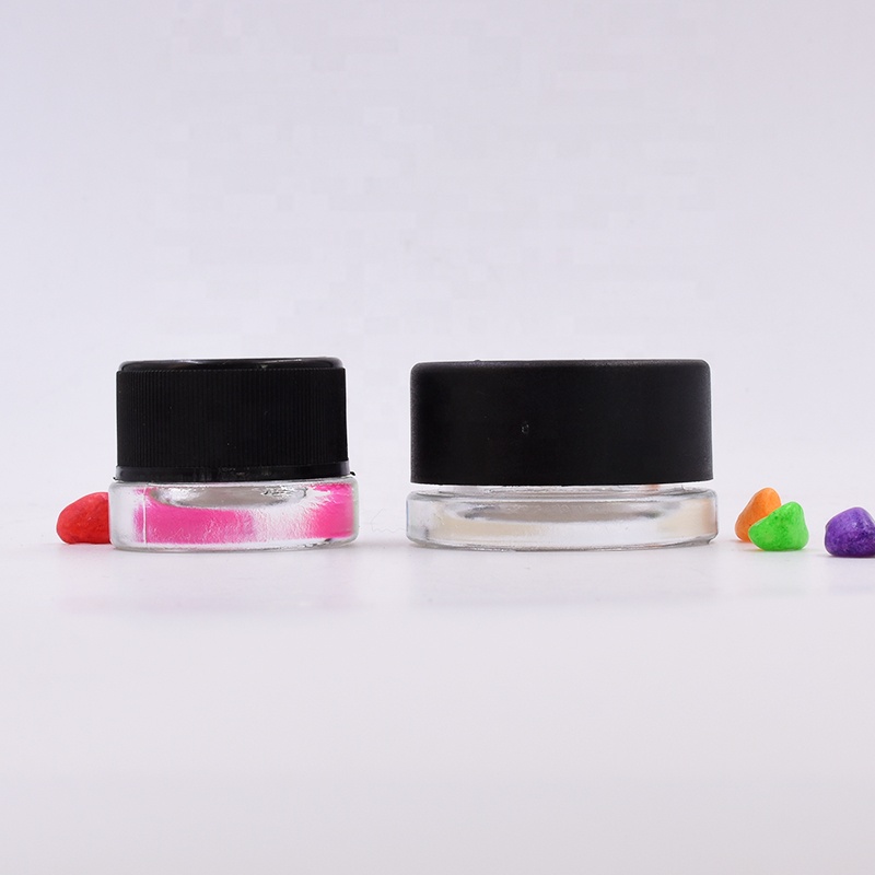 OEM 9 ml clear round small straight side eye cream cosmetic packing glass jar with black plastic child proof lid.