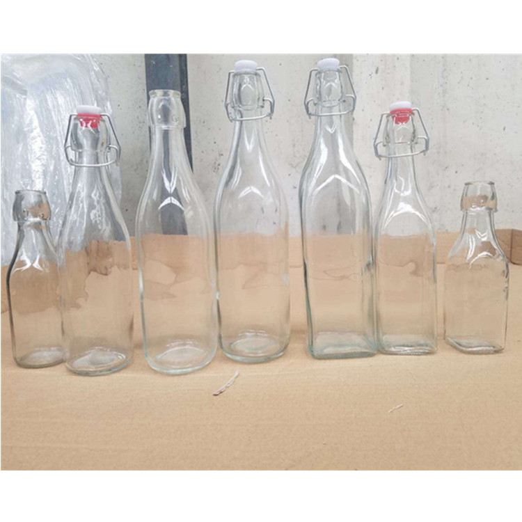 OEM Factory Wholesale Price Airtight Clip Top Transparent Glass Bottles for Beverage
