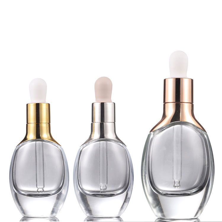 OEM Luxury Factory Wholesale Cosmetic Packaging Rose Gold Cap 15ml 30ml Serum Glass Dropper Bottles For Essential Oils E Liquid