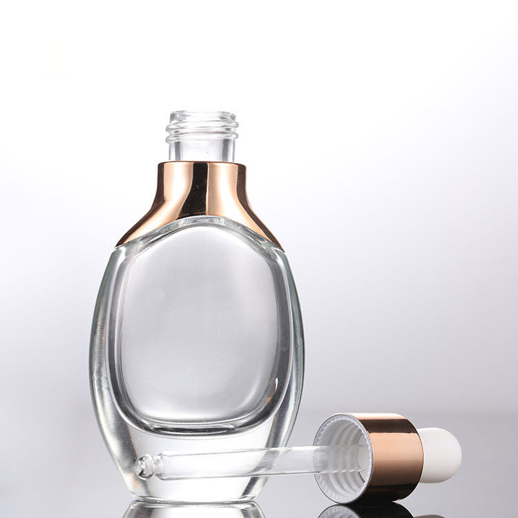 OEM Luxury Factory Wholesale Cosmetic Packaging Rose Gold Cap 15ml 30ml Serum Glass Dropper Bottles For Essential Oils E Liquid
