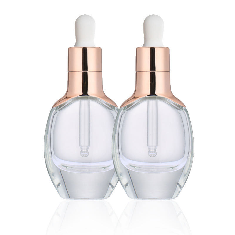 OEM Luxury Factory Wholesale Cosmetic Packaging Rose Gold Cap 15ml 30ml Serum Glass Dropper Bottles For Essential Oils E Liquid