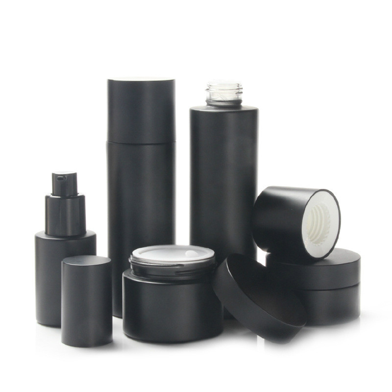 OEM ODM Frosted black cosmetic jar set glass bottle skin care packaging container