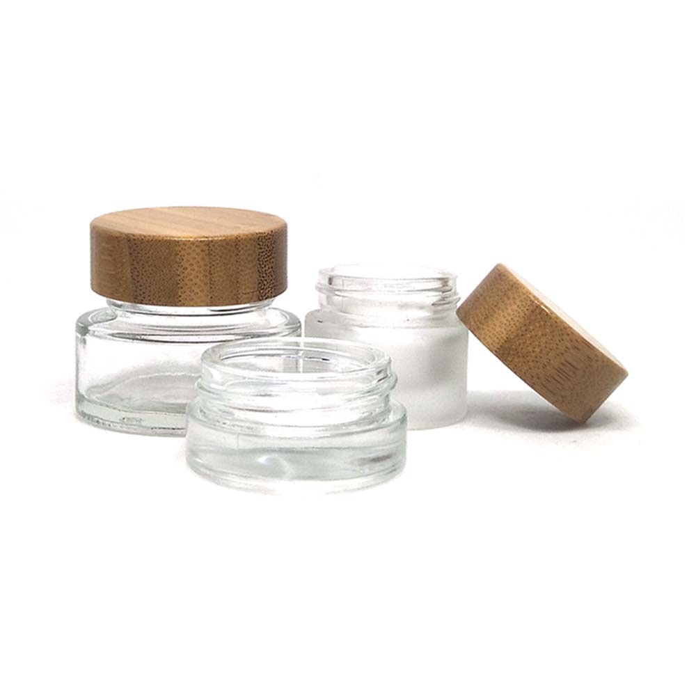OEM ODM engraved printing logo Cosmetic clear frosted glass jar with bamboo wood cover for body cream
