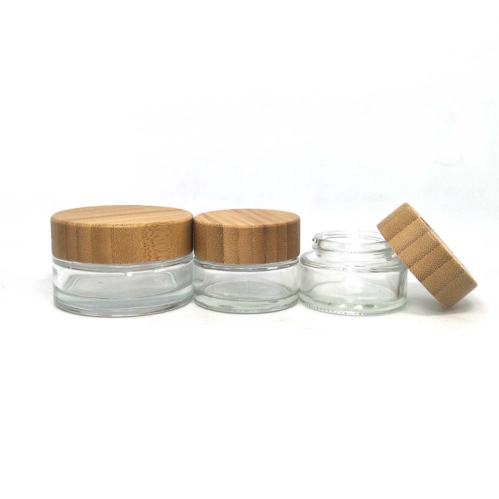 OEM ODM engraved printing logo Cosmetic clear frosted glass jar with bamboo wood cover for body cream