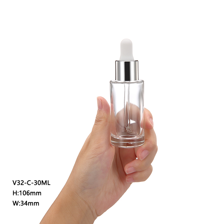 OEM/ODM wholesale cylindrical emty 1oz private label 30 ml glass dropper bottle with gold dropper for serum