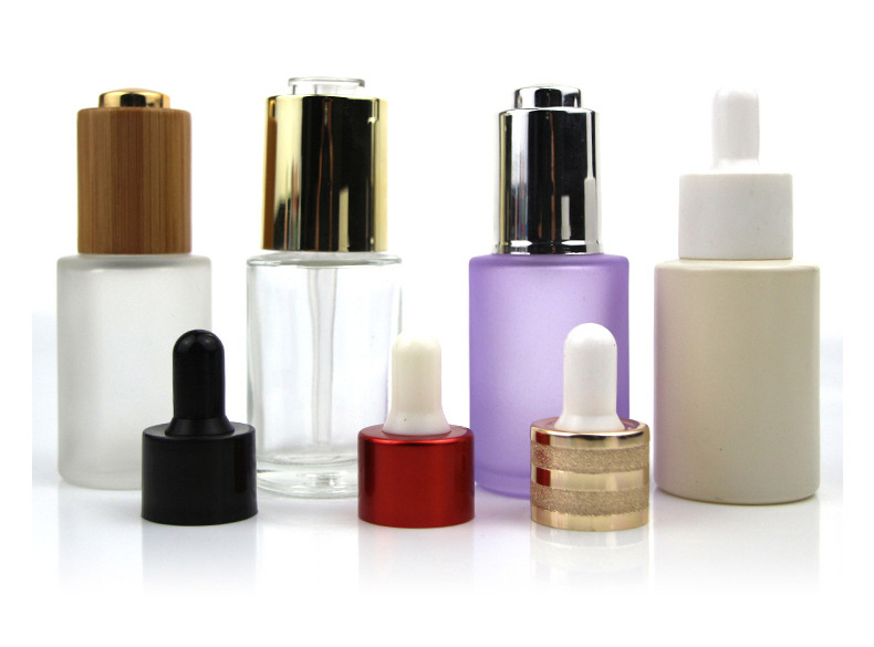 OEM Skin care packaging bottles custom yellow color flat shoulder oil dropper bottle 30ml glass bottle with gold dropper