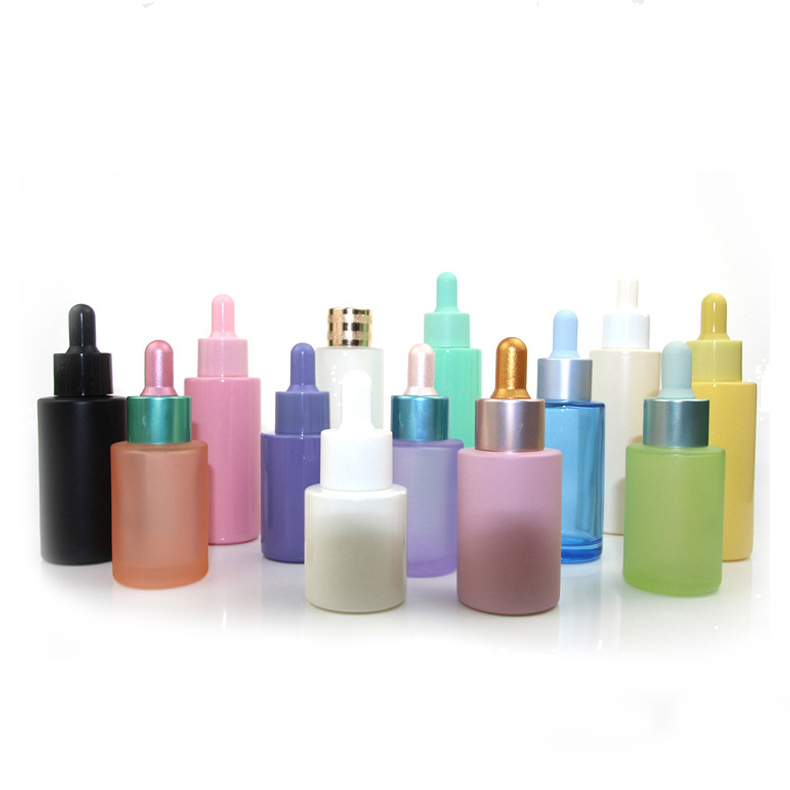 OEM Skin care packaging bottles custom yellow color flat shoulder oil dropper bottle 30ml glass bottle with gold dropper