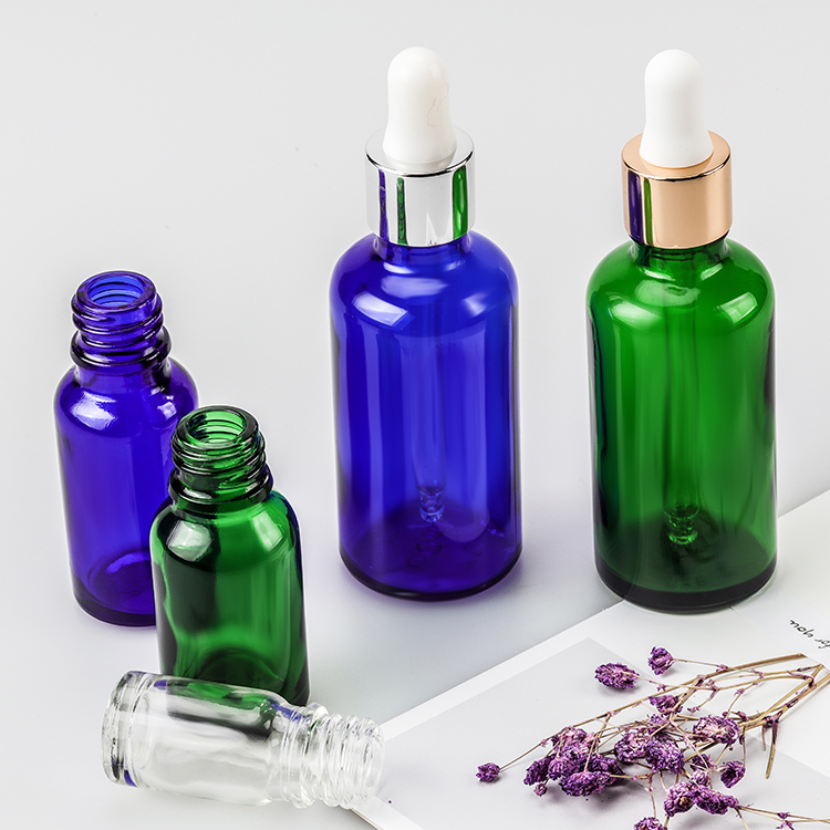 OEM Wholesale 10ml 30ml, 50ml Amber Blue Green Essential Oil Bottle Custom Private Label Dropper Glass Serum Bottle/