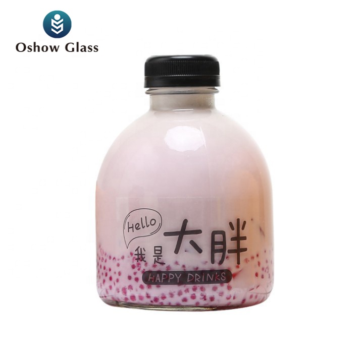 OSHOW 300ml 500ml new design round glass beverage bottle for juice coffee milk wine with lid